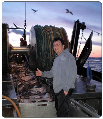 Captain Glenn Kierce with his commercial catch as the captain of the Northern Investor
